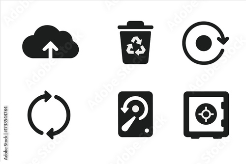 Data Backup Icons. Solid, filled icon set of data backup and recovery: cloud backup, external drive, recycle bin, restore point, sync arrows, shield with