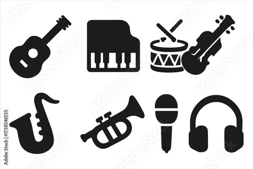 Musical Icons Collection. Solid, filled icon set of musical instruments: guitar, piano, drum, violin, saxophone, trumpet, microphone, headphones. Solid, filled