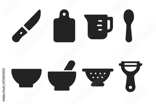 Kitchen Tool Icons. Solid, filled icon set of kitchen food preparation tools: knife, cutting board, measuring cup, measuring spoon, mixing bowl, mortar and