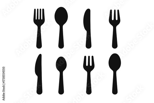 Black Silverware Icons. Solid, filled icon set of silverware essentials: dinner fork, soup spoon, butter knife, dessert fork, steak knife, teaspoon, salad