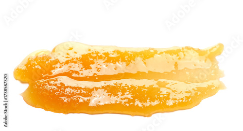 Fotografie Natural crystallized honey spill isolated on white, side view