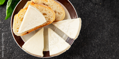 Processed cheese triangle spread portion size cheese for sandwich tasty snack fresh delicious gourmet food background on the table rustic food top view copy space