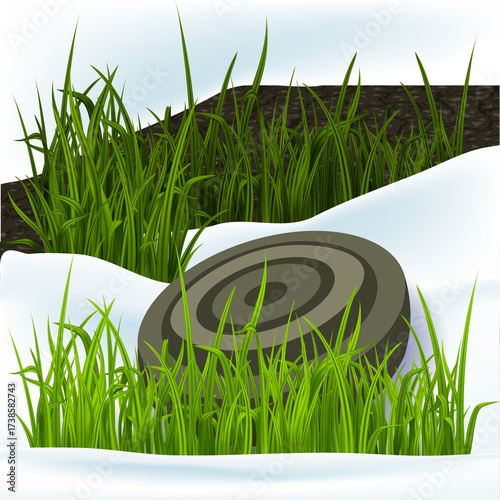 The mine is camouflaged in the grass and snow