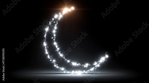 Crescent moon shape formed from glittering sparks against a dark background