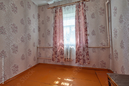old empty room with a window
