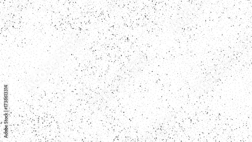 Black dotted stipple texture on white surface. Grain noise vector pattern for grunge overlay or abstract background. Abstract graphic design element.