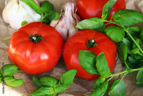 large tomatoes with basil and garlic