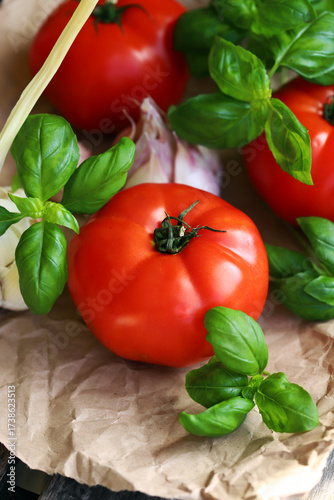 large tomatoes with basil and garlic