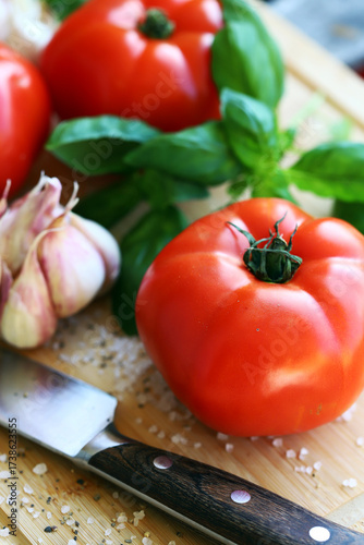 large tomatoes with basil and garlic