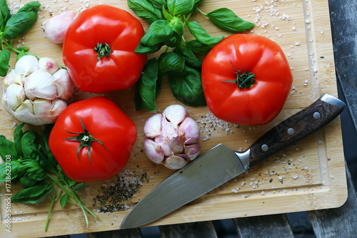 large tomatoes with basil and garlic