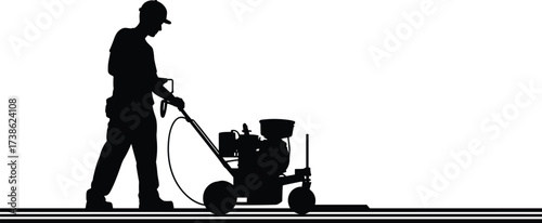 Silhouette of construction worker operating line striping machine for road or pavement marking, showing traffic control, painting lines, and infrastructure maintenance activity\