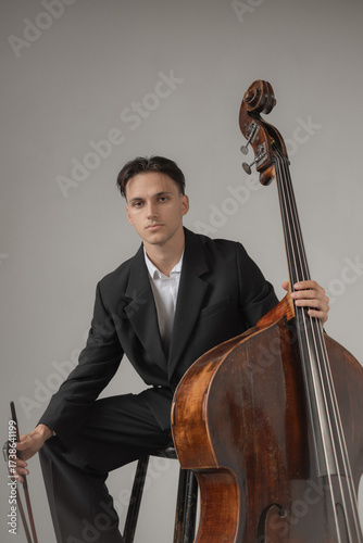 young man playing contrabass