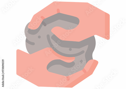 Two hands cupping and holding a grey, textured, amorphous object, possibly clay.