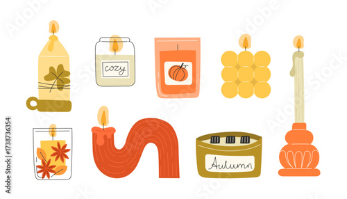 Assorted candles in various shapes and colors some with decorative elements