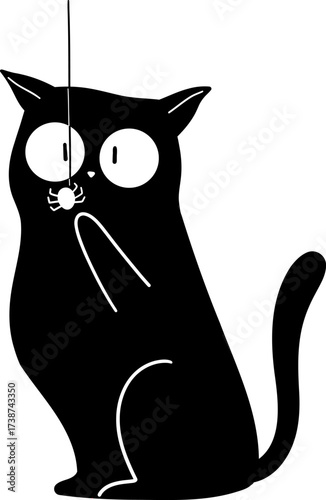 Black cat startled by a dangling spider