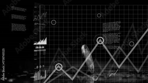 Coin getting nudged, tilting and spinning to reveal face as digital charts converging show growth