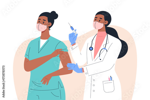 Doctor administering vaccine to healthcare worker