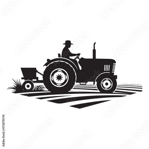 Silhouette of a farmer driving a vintage tractor across a field planting seeds with attached agricultural equipment