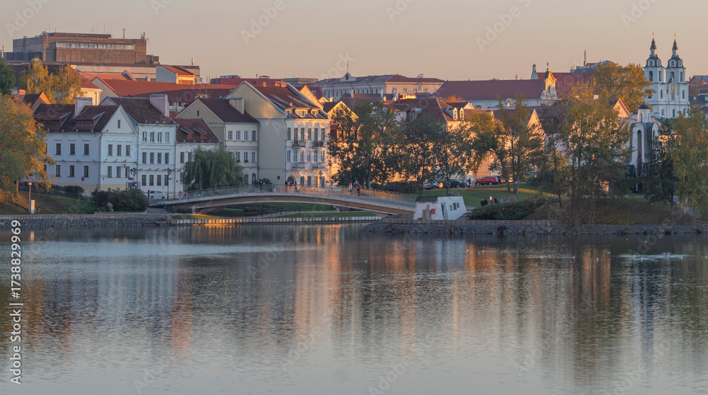 Fototapeta premium Golden autumn in Minsk by the river. Belarus.