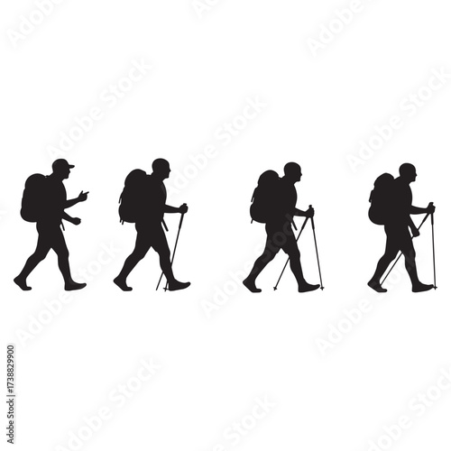 Silhouettes of hikers with backpacks and poles hiking