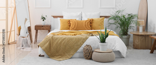 Interior of light bedroom w...