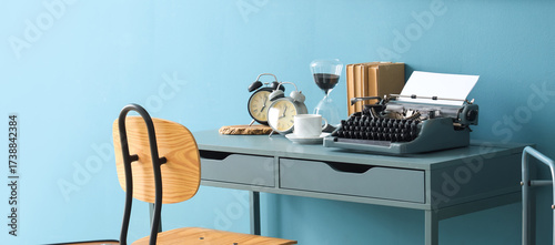 Vintage typewriter with cof...