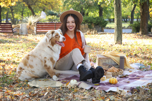 Young happy Asian woman wit...