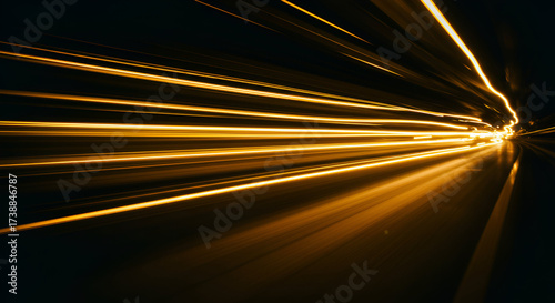 Dynamic streaks of golden light illuminating a dark tunnel environment