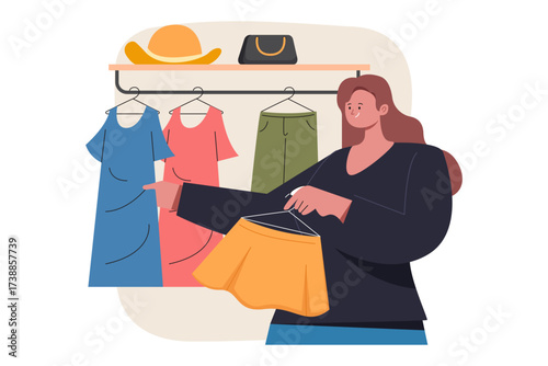 Person choosing clothes from a rack with a skirt