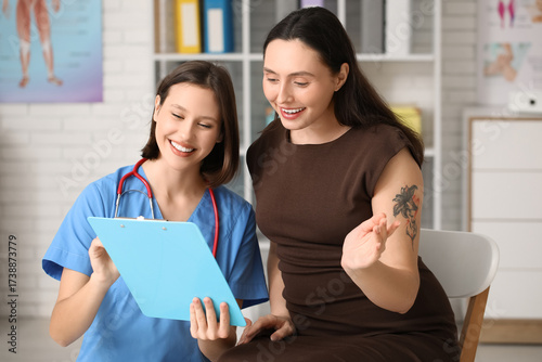 Happy young female doctor s...