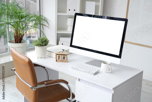 Stylish workplace with mode...