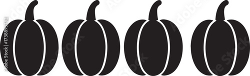 Shadowy Autumn Bounty: A quartet of iconic gourds, silhouetted in stark contrast, stands as a testament to the harvest season, evoking warmth and the spirit of Thanksgiving.