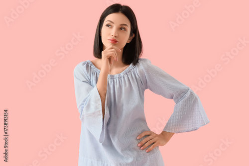 Thoughtful young woman on p...