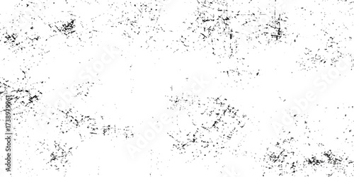 Black and white abstract grunge texture with a dirty paint splash and ink drop pattern design