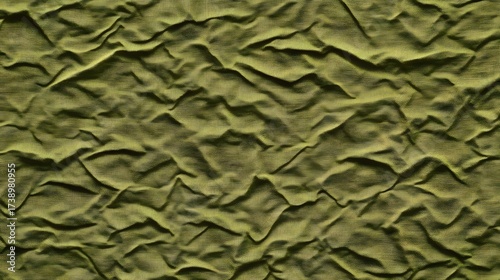Wrinkled fabric olive green texture background for adding a rustic feel and natural aesthetic