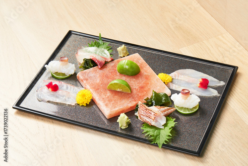 Photography Salt Plate Sashimi Platter, Assorted Japanese sashimi served on Himalayan salt b