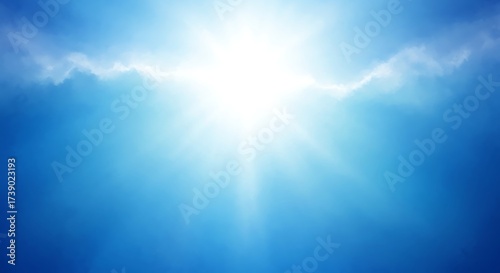 Bright sunlight illuminating the sky with soft clouds and blue background