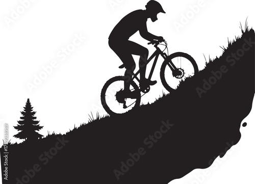 Black silhouette of mountain biker riding uphill on grassy slope