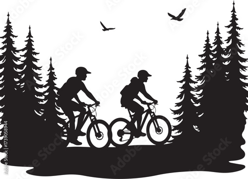 Two cyclists riding mountain bikes through pine forest silhouette