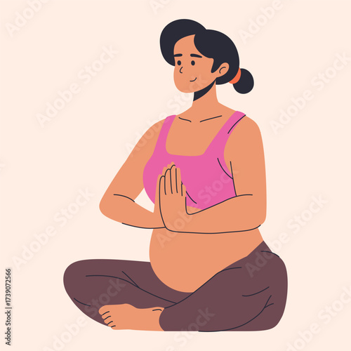 Mother Pregnant doing yoga exercise indoors