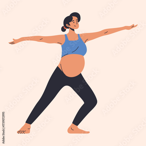 Pregnant Mother doing yoga exercise in fitness studio