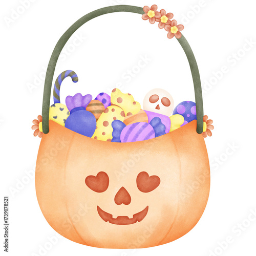 Pumpkin basket cute filled with colorful candies and treats.