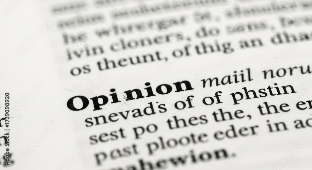 Fototapeta premium Close-up of a dictionary page, with the word 'Opinion' highlighted in bold text