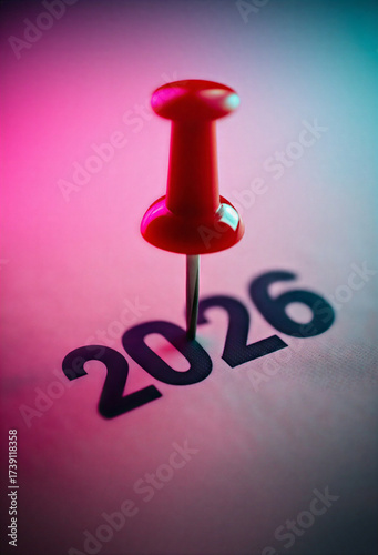 Pin Marking the Year 2026 on a Calendar