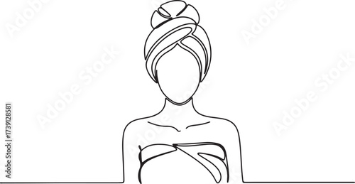 Woman wrapped in towel on white background