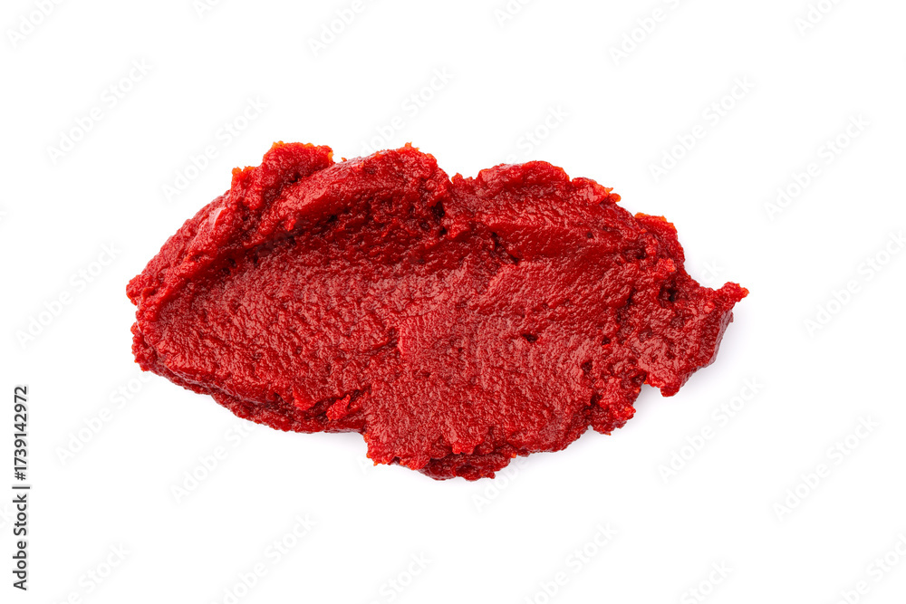 Fototapeta premium Tomato or pepper paste or puree prepared to add flavor to dishes on a white background