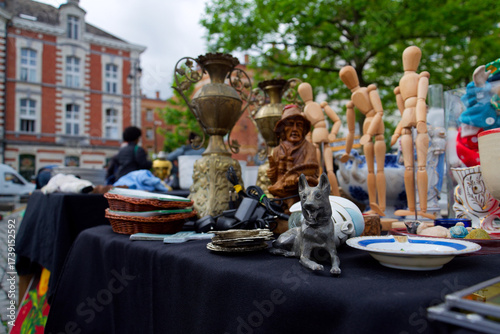 Old vintage things on the street flea market on Place du Jeu de Balle, Marolles district of Brussels, Belgium