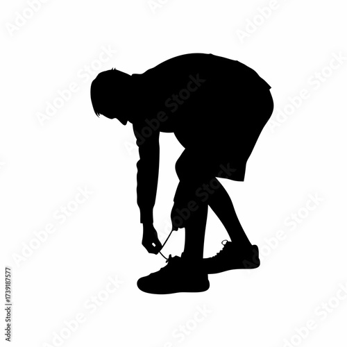 Silhouette of a man tying shoelaces isolated on white background