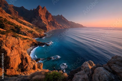 Cliff overlooking the ocean at sunset perfect for travel ads and nature presentations