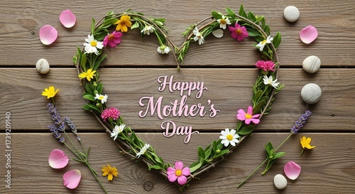 Heart Shaped Wreath with Flowers and Happy Mothers Day Message on Wood.